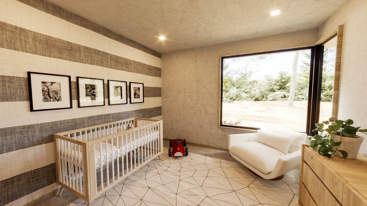 A modern baby nursery with a crib, striped accent wall, artwork, a white armchair, and a geometric rug.