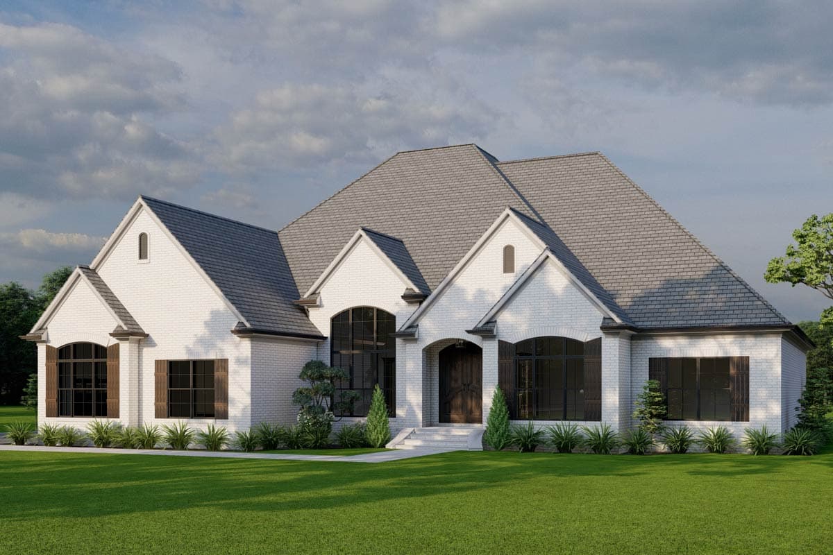 House plan exterior: Modern home with white brick, prominent gables, arched windows, and a covered entryway.