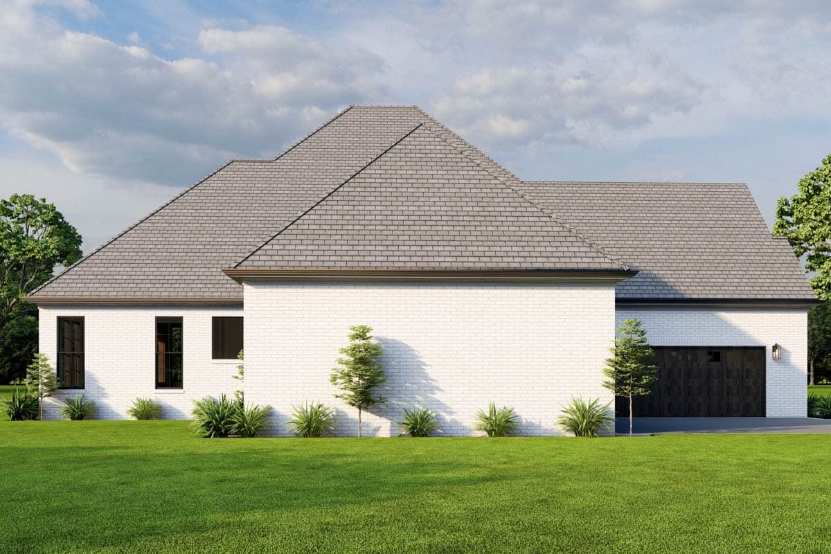 House plan exterior with white brick, gray tile roof, multiple gables, and a dark wood garage door.