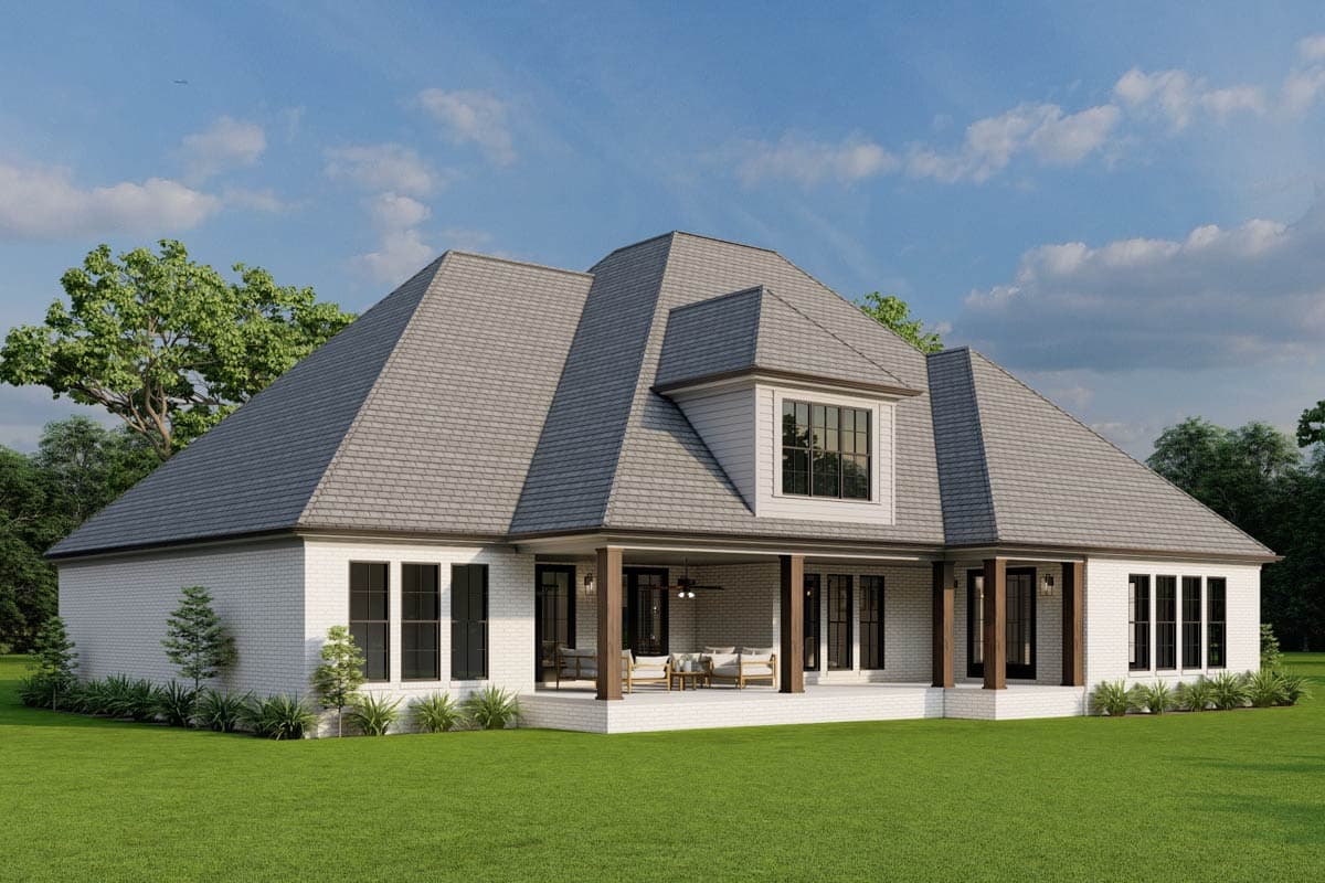 House plan exterior: White brick, hip roof, dormer, and covered porch with wood columns.