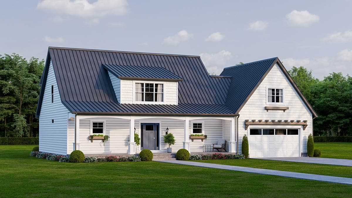 A modern white house with a dark gray metal roof, porch, and attached garage sits on a well-manicured lawn under a cloudy sky.
