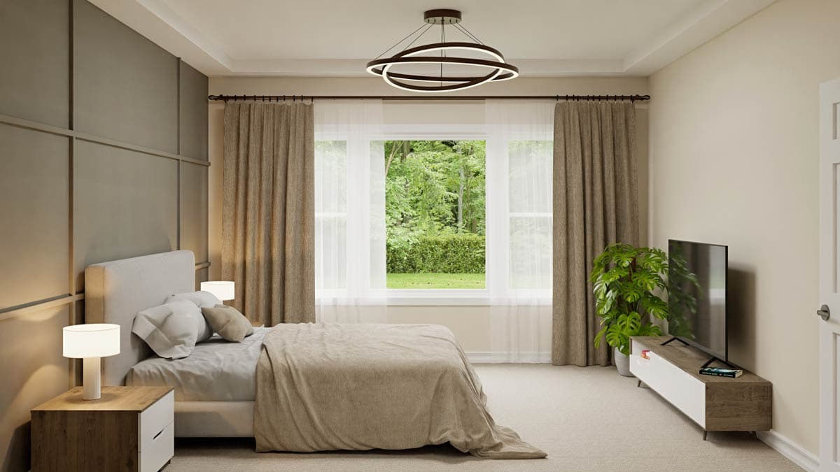 Cozy bedroom with a large window overlooking lush greenery. Features a bed, nightstands, a modern TV unit, and an artistic light fixture.