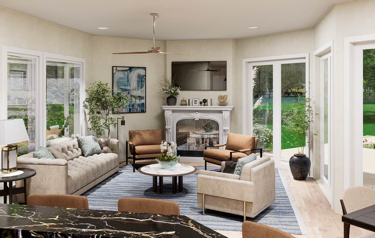 Living room rendering with tufted sofa, ornate fireplace, armchairs, round coffee table, and large windows with garden view.