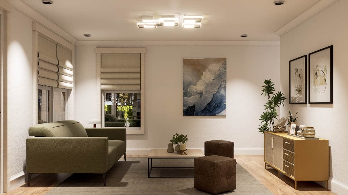 A modern living room with a green sofa, artwork, and a coffee table. The room has neutral tones and ambient lighting.