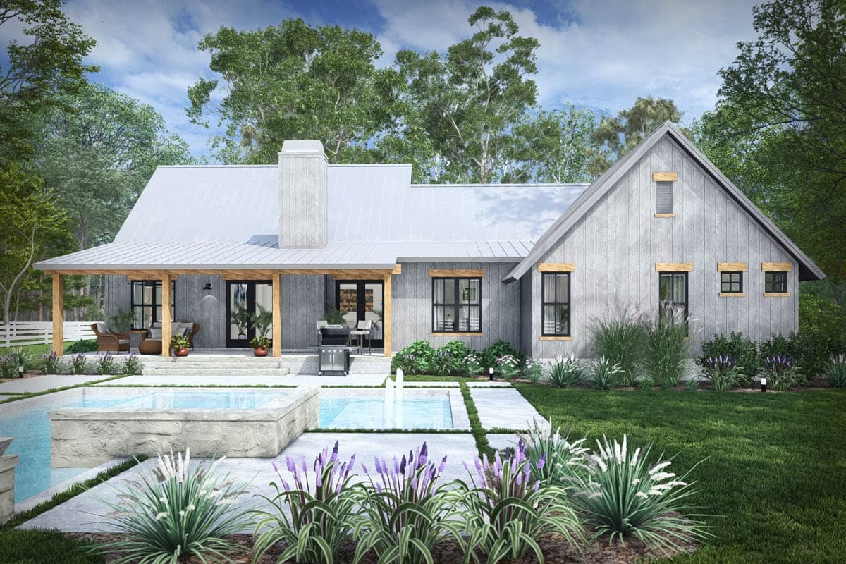 Modern farmhouse house plan exterior with gabled roof, metal roof, covered porch, stone chimney, and multiple windows.