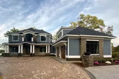 Expansive 4-Bedroom House Plan with Home Office, Sunroom & Game Room