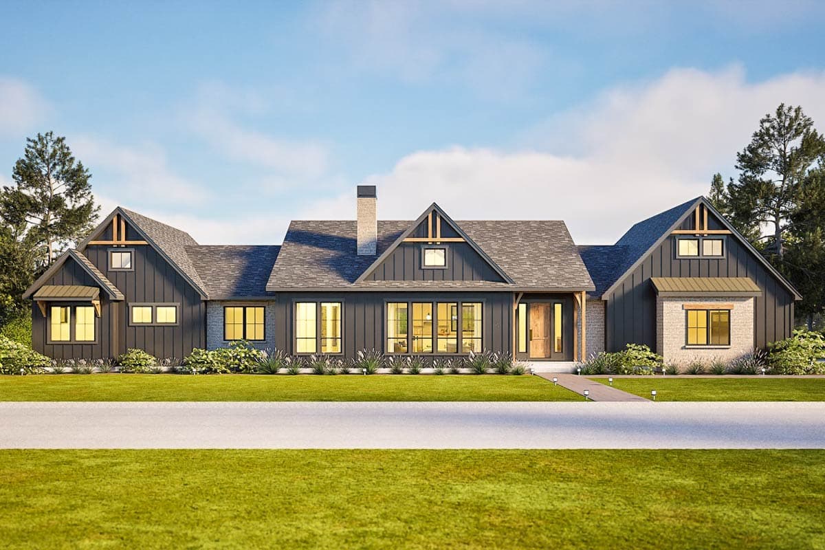 Modern Farmhouse house plan exterior. Features include gabled roof, board-and-batten siding, stone accents, and shed dormers. One story home.