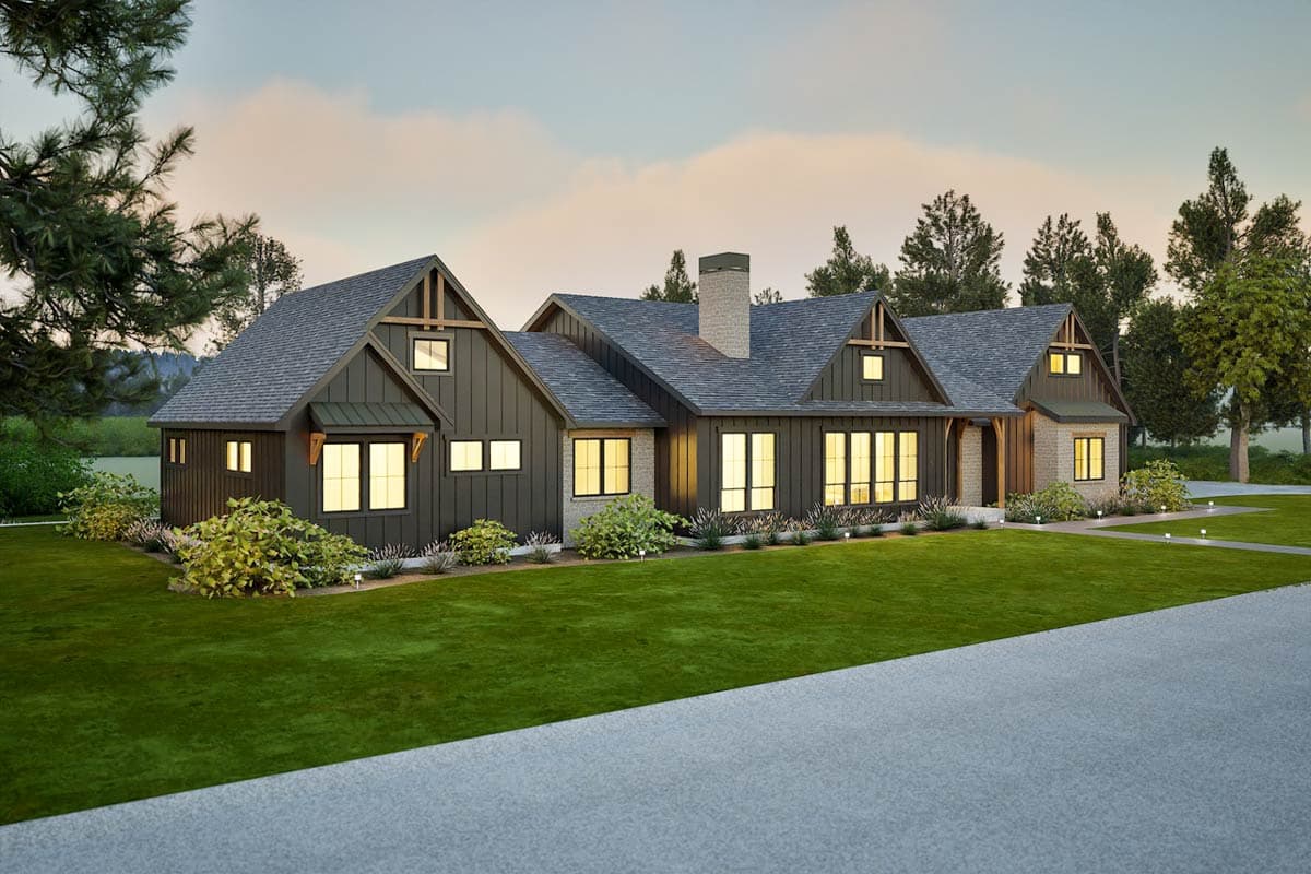 Modern Farmhouse house plan exterior with multiple gables, stone accents, and a prominent chimney.