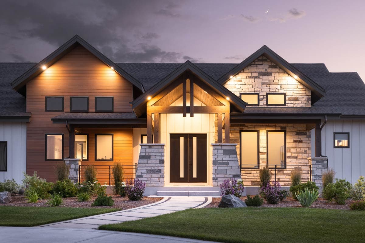 Modern house plan exterior featuring stone and wood siding, prominent gables, covered entryway with timber accents, and multiple windows.