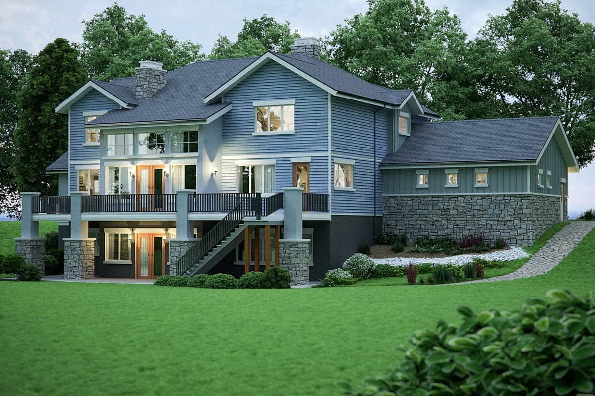 House plan exterior: Blue two-story home with stone accents, a large wrap-around deck, and multiple gables.