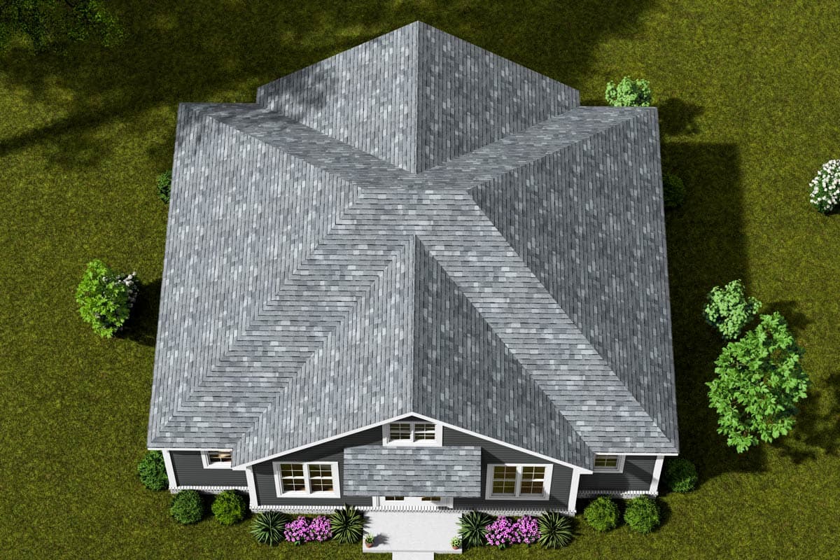 House plan exterior, one story with prominent cross-gabled roofline, front entrance with central dormer and multiple windows.