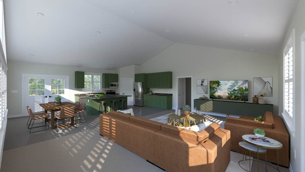 Open concept living space with vaulted ceiling, dining area, kitchen with island, and living room with sectional sofa.