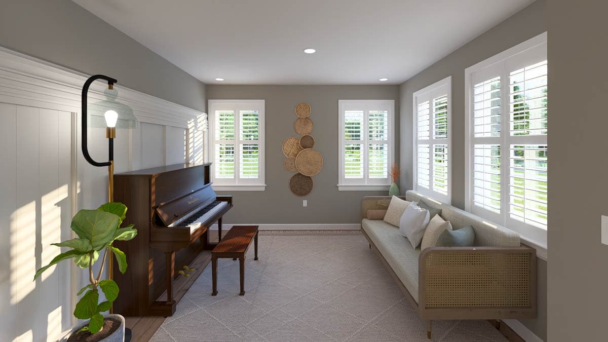 Interior view: Room with upright piano, bench, sofa, and plantation shutters on windows.