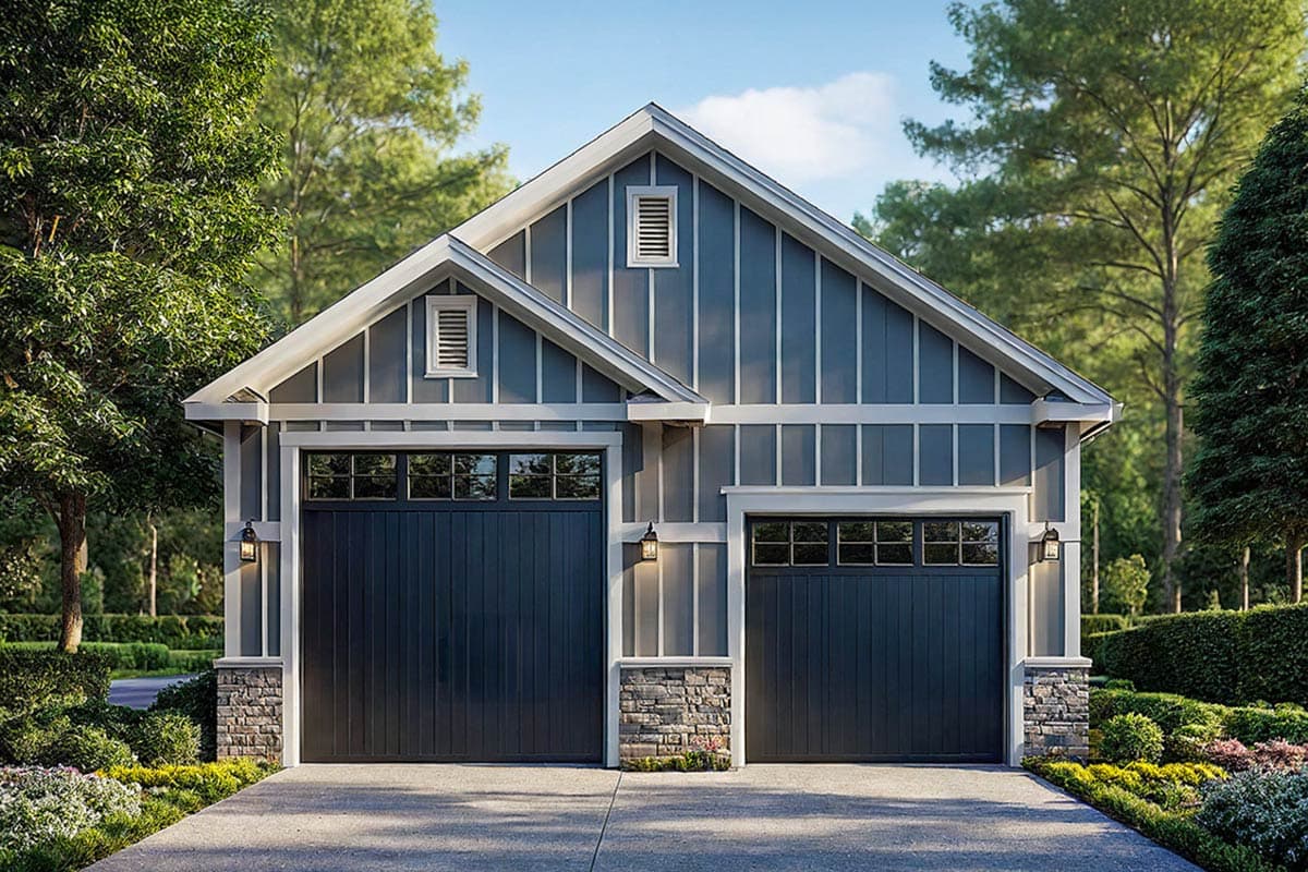 Modern Farmhouse style garage exterior with two bays, board and batten siding, stone accents, and gabled rooflines.