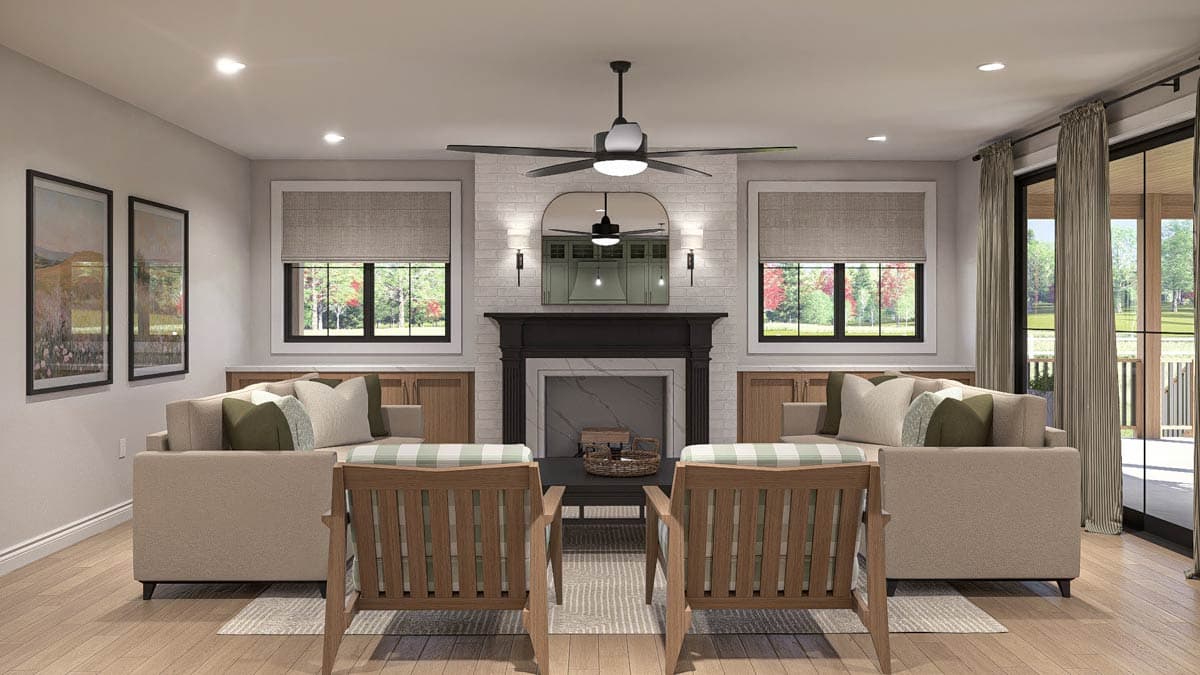 Great room rendering with fireplace, built-in cabinetry, two sofas, two chairs, and large windows overlooking outdoors.