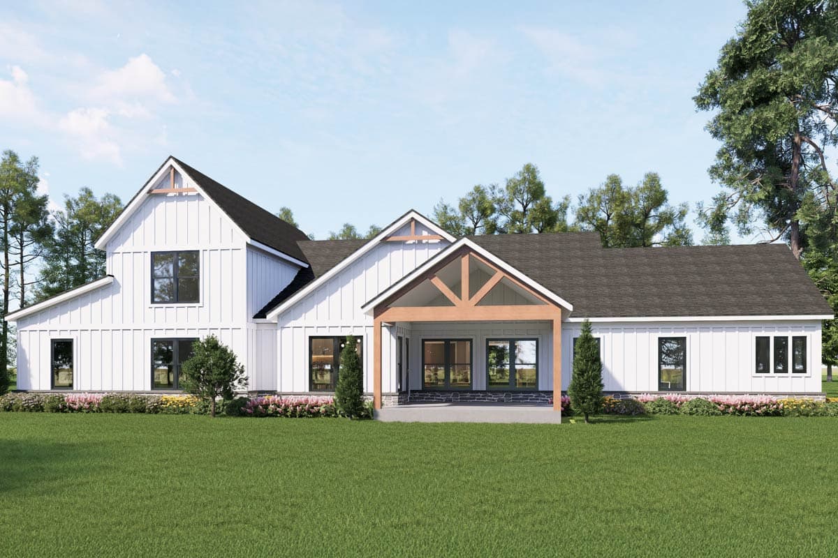 Modern Farmhouse house plan exterior with white board and batten siding, prominent gables, and a covered porch with timber framing.