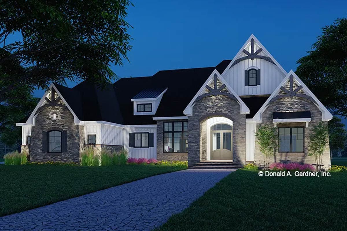 Modern Farmhouse house plan exterior with stone accents, white board-and-batten siding, arched entry, and prominent gables with exposed beams.