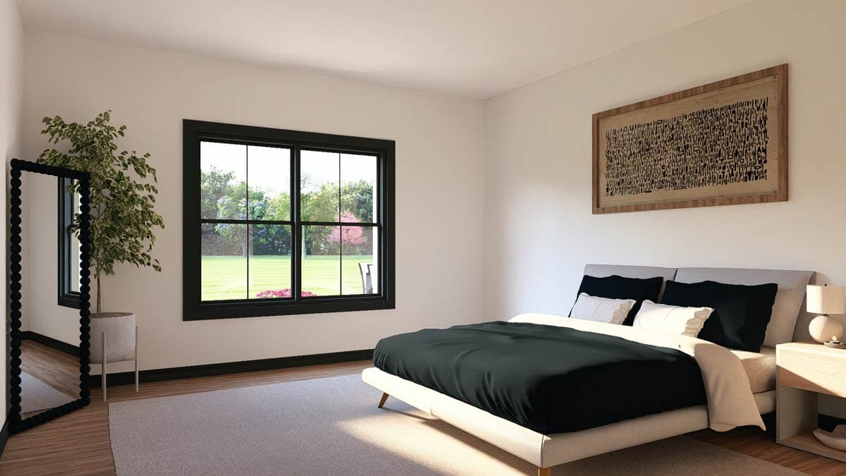 Bedroom interior with large black-framed window, platform bed with dark bedding, and floor mirror. House plan rendering.