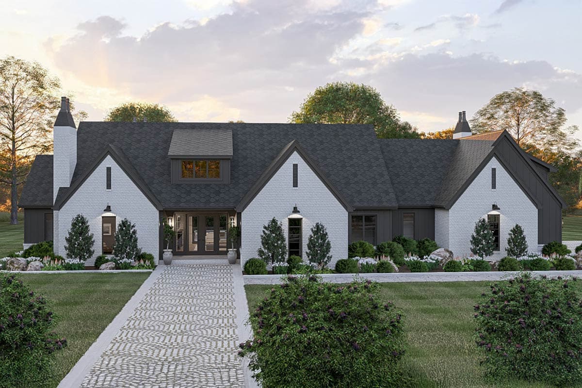 House plan exterior. Two-story Modern Farmhouse with gabled roof, brick facade, and dormer windows. Front entrance has double doors.