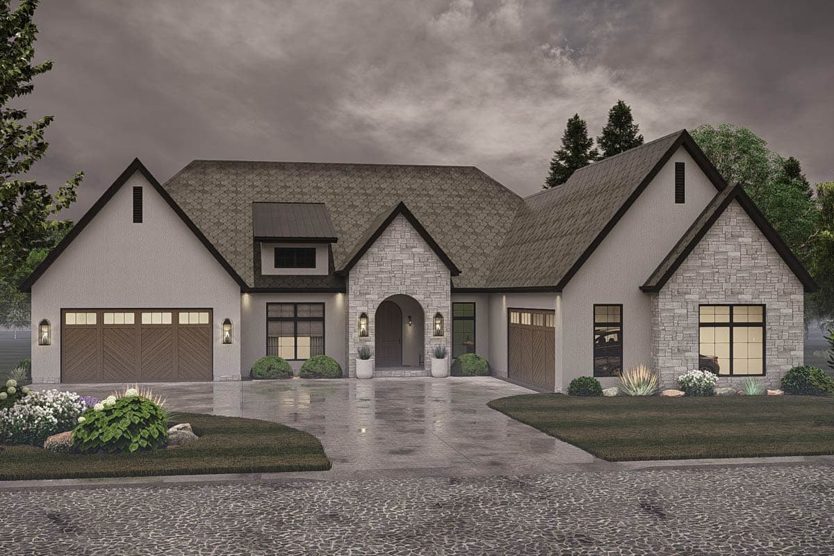 House plan exterior with stone accents, arched entry, multiple gables, and two-car garage.