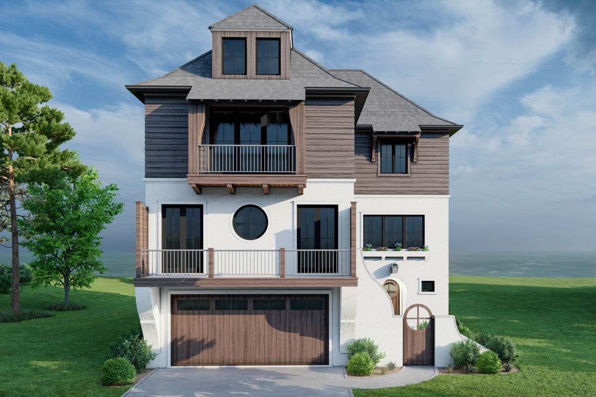 House plan exterior. Three-story home with balcony, dormers, and a gabled roof. Features include a garage and a circular window.