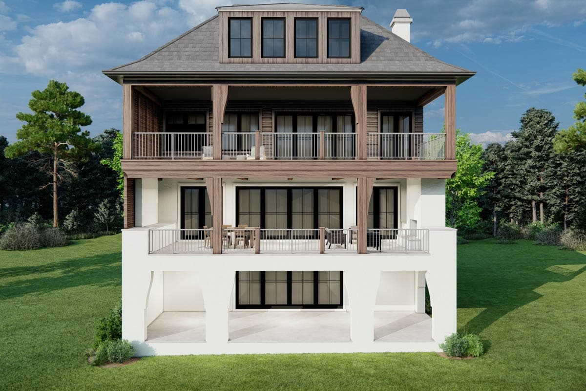 House plan exterior: three-story modern home with upper and lower balconies, dormer windows, and exposed wood beams.