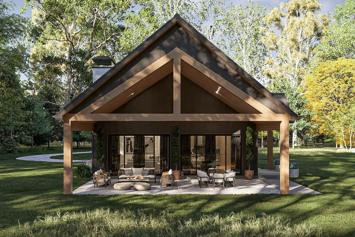 Modern house plan exterior with large gable roof, exposed wooden beams, covered patio, and stone chimney.
