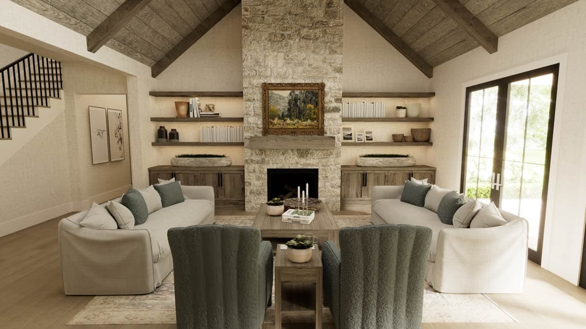Luxurious living room with a stone fireplace, light sofas, and wooden accents, creating a cozy and inviting atmosphere.