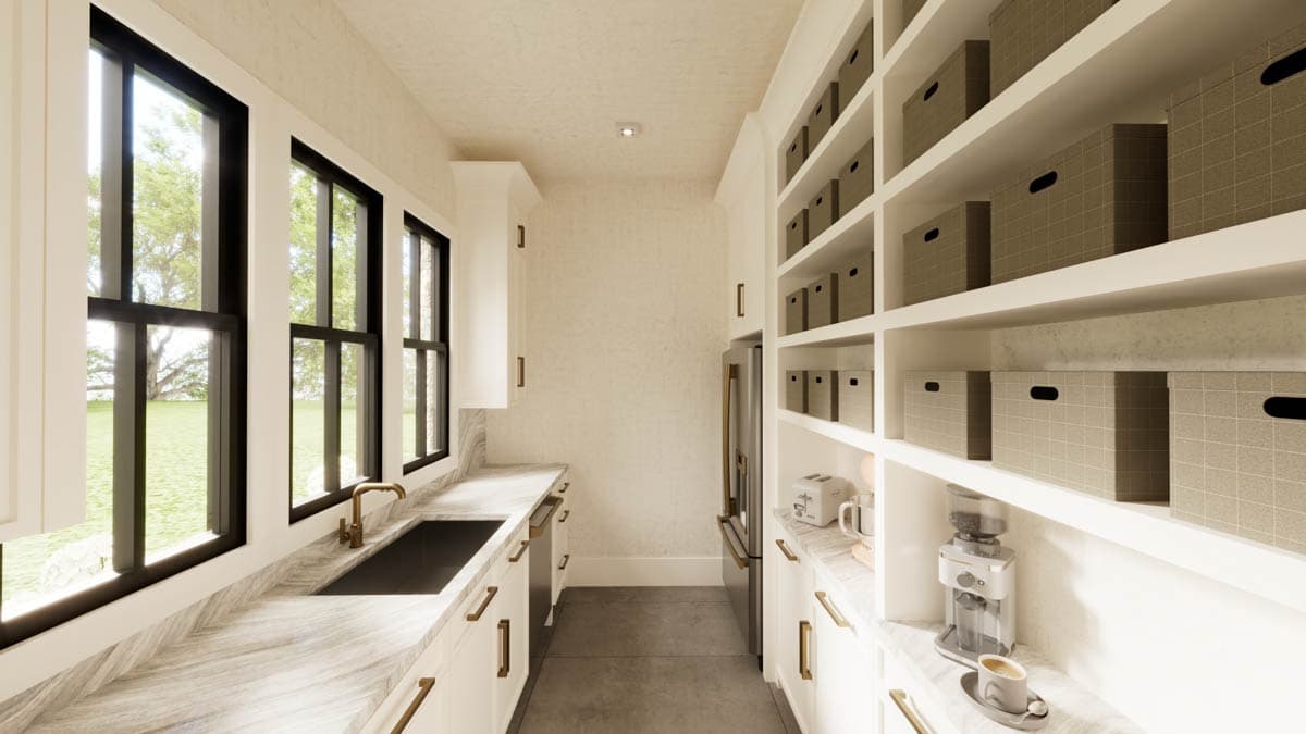 Interior of a pantry with white cabinets, marble countertops, large windows, and storage shelves with boxes.