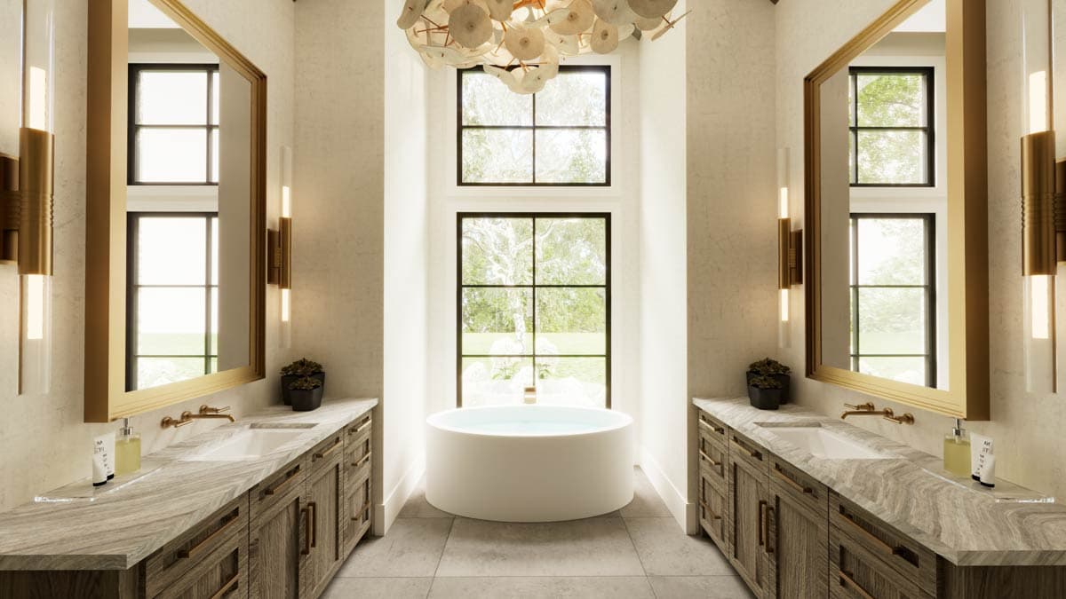 Luxurious bathroom with dual vanities, large mirrors, a round tub, and a large window offering a view of greenery outside.