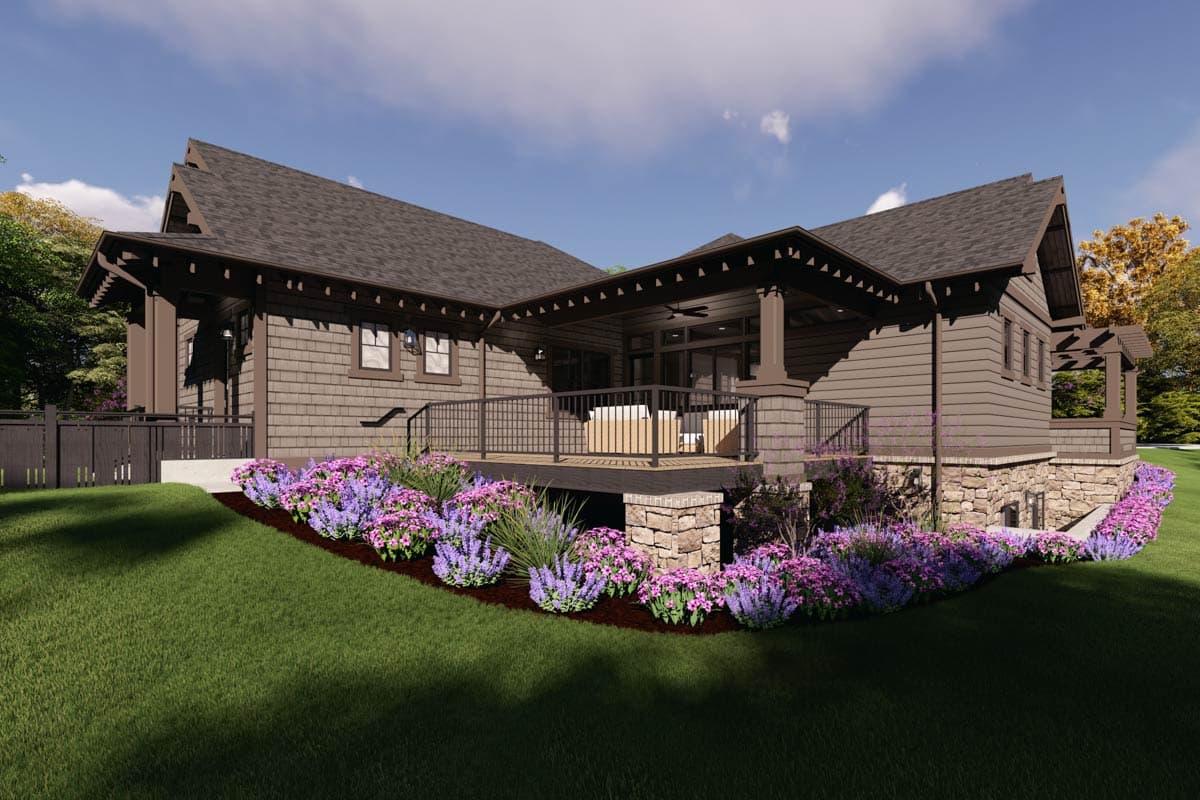Craftsman style house plan exterior with stone accents, gables, covered deck, and full basement.