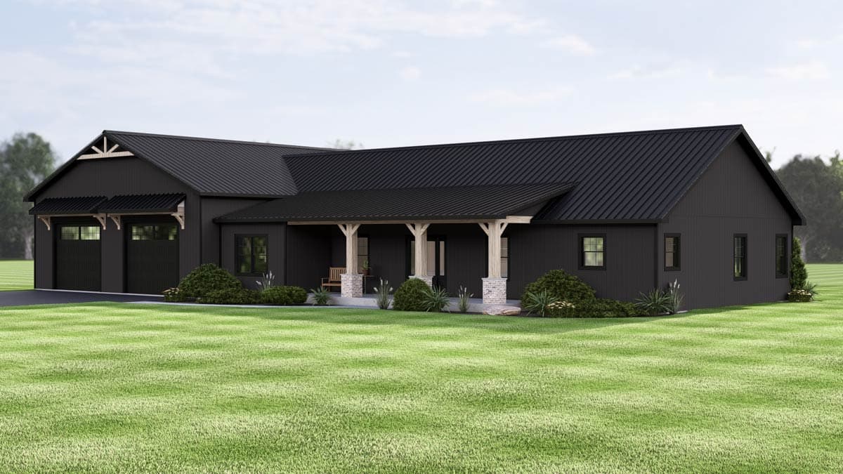 Modern black farmhouse with a metal roof, porch with wood columns, and attached garage. Green lawn surrounds the house.
