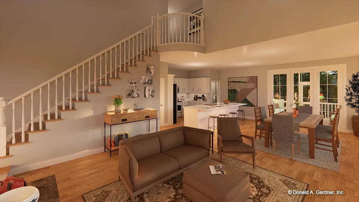 Interior rendering of an open-concept living area with a staircase, kitchen island, and dining room.