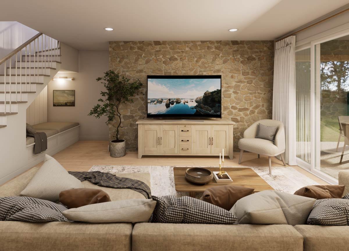 Interior view of living room with stone accent wall, wooden credenza, TV, sofa, coffee table, and stairs with built-in bench.