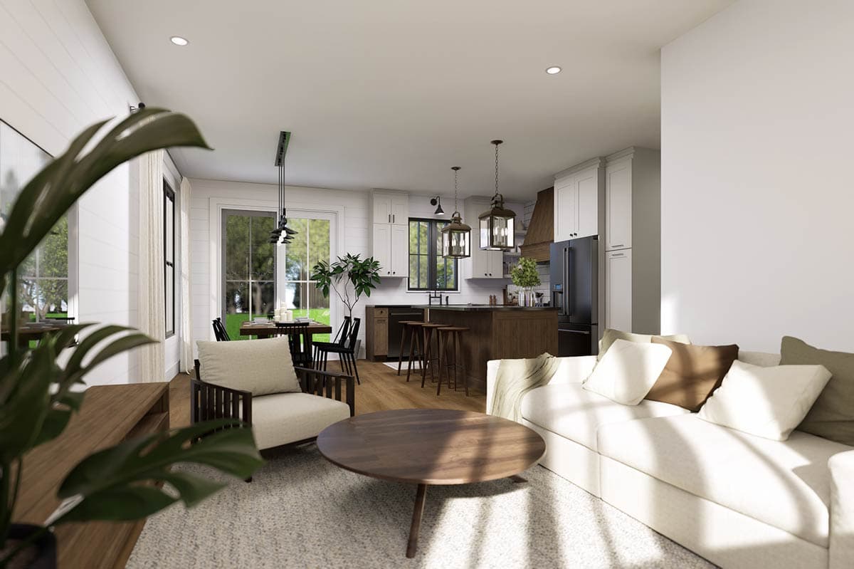 Interior rendering of an open-concept living area showing a kitchen island, dining table, and sofa.