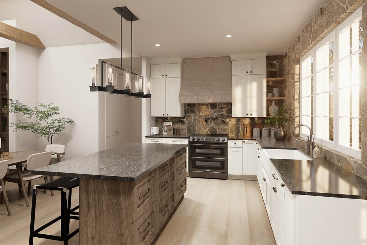 A modern kitchen features a large island with a gray countertop and a stone backsplash behind the oven and range hood.
