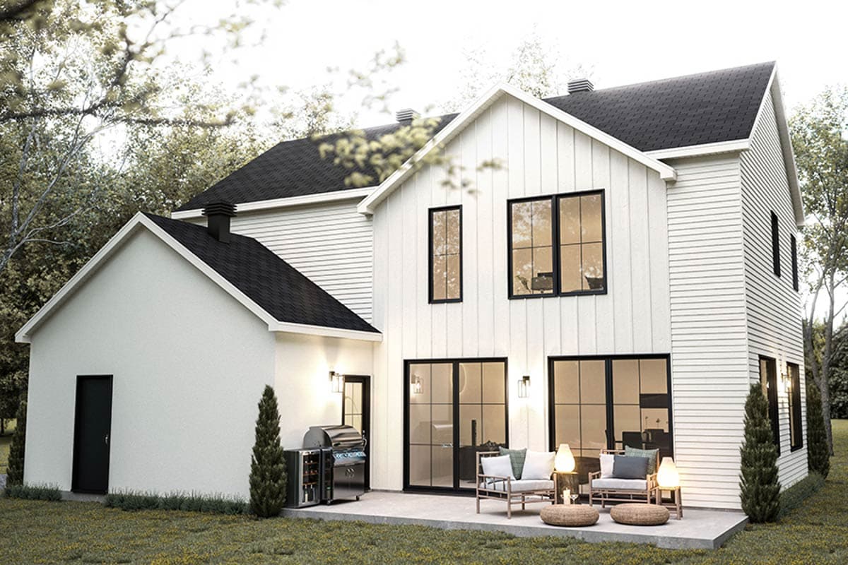 Modern Farmhouse house plan exterior, two stories, white siding, gables, black-framed windows, and patio.