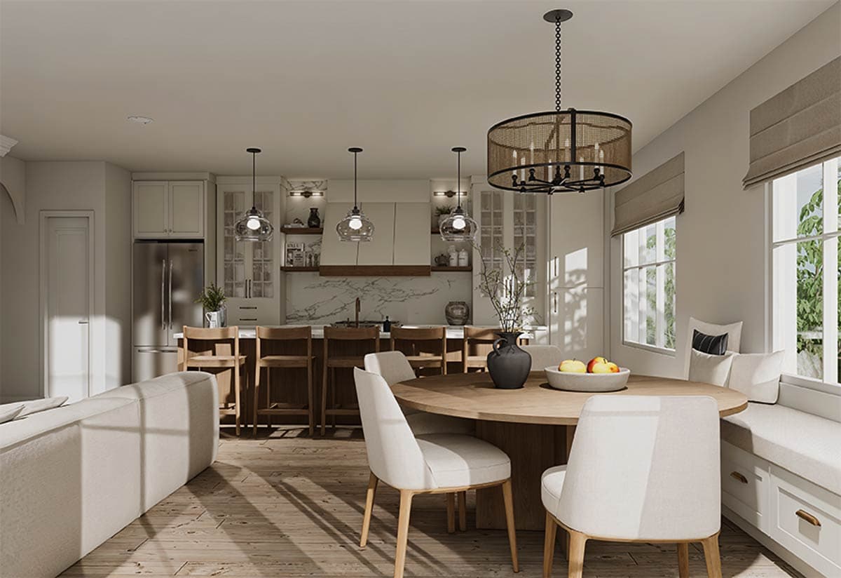 Open concept kitchen and dining area with island, natural wood floors, ample lighting, and large windows.