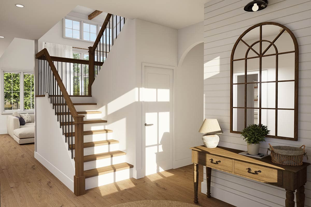 Interior rendering of a house entry with a wooden staircase featuring black spindles, a console table with arched mirror, and natural light.