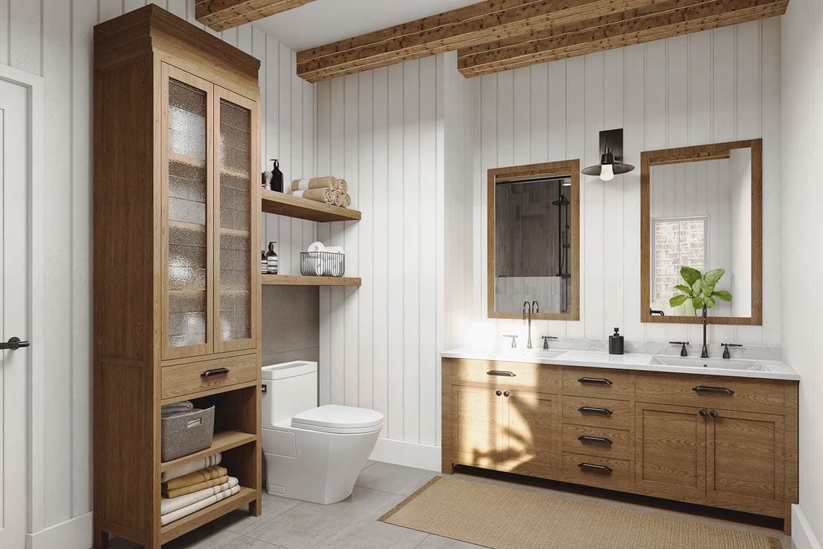 Bathroom featuring a double vanity, freestanding cabinet with glass doors, toilet, and exposed wood ceiling beams.