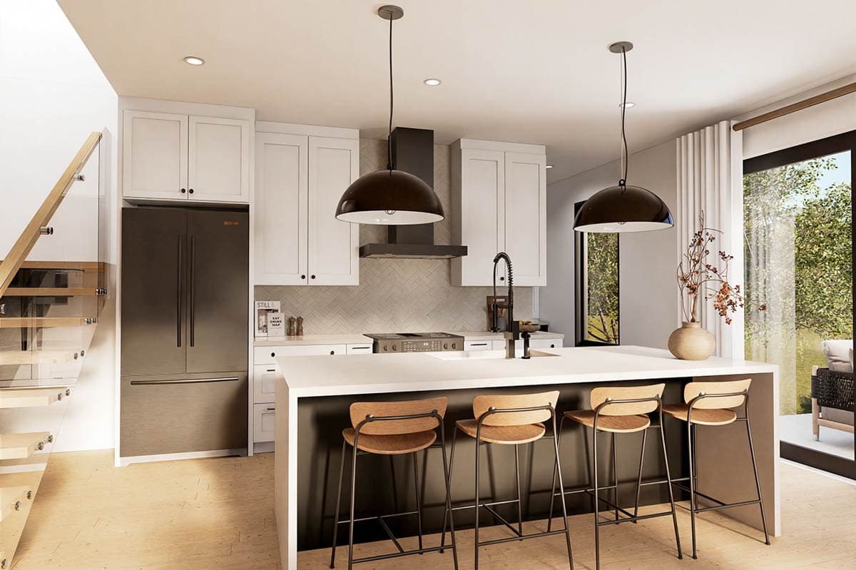 Modern kitchen with island, pendant lights, stainless steel refrigerator, white cabinetry, and herringbone tile backsplash.
