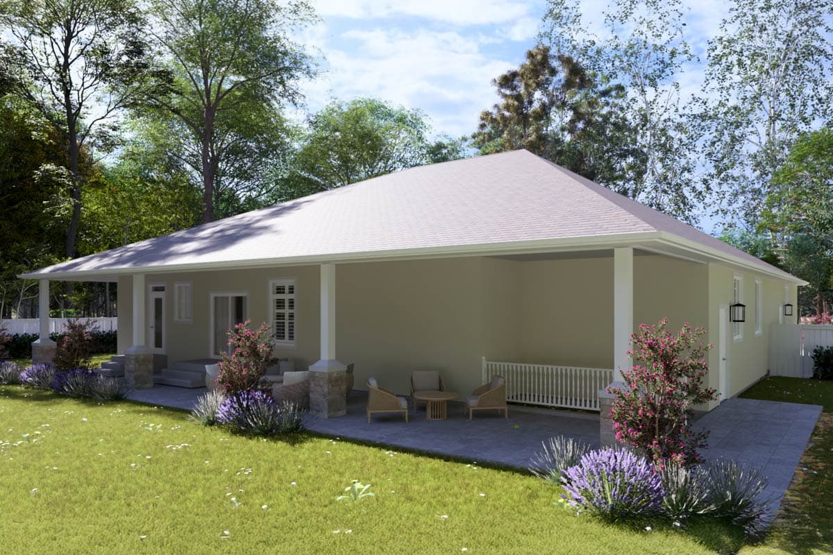 One-story house plan exterior with wraparound porch, stone-accented columns, gabled dormer, and asphalt shingle roof.