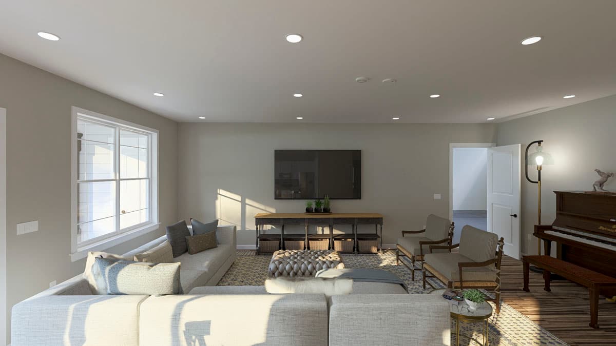 Living room interior with sectional sofa, TV, console table, ottoman, two chairs, piano, and a window.