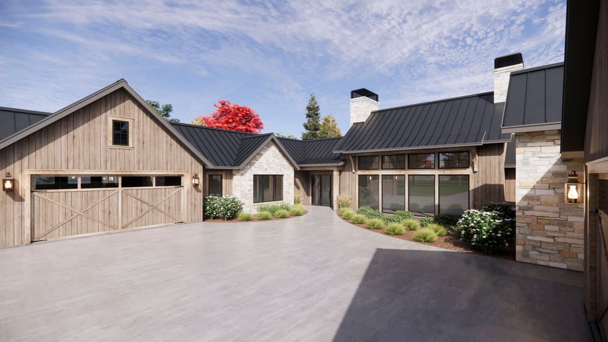 Exterior view of a modern house with a mix of wood and stone siding. Features include a driveway, garage doors, and a decorative red tree.