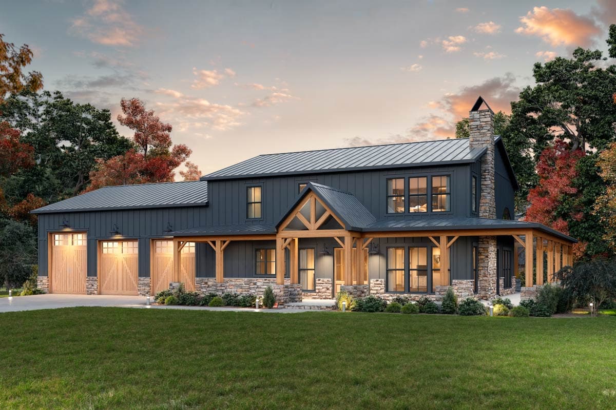 House plan exterior. Two-story Modern Farmhouse with a gabled entry, stone accents, a covered porch, and a metal roof over the main structure.