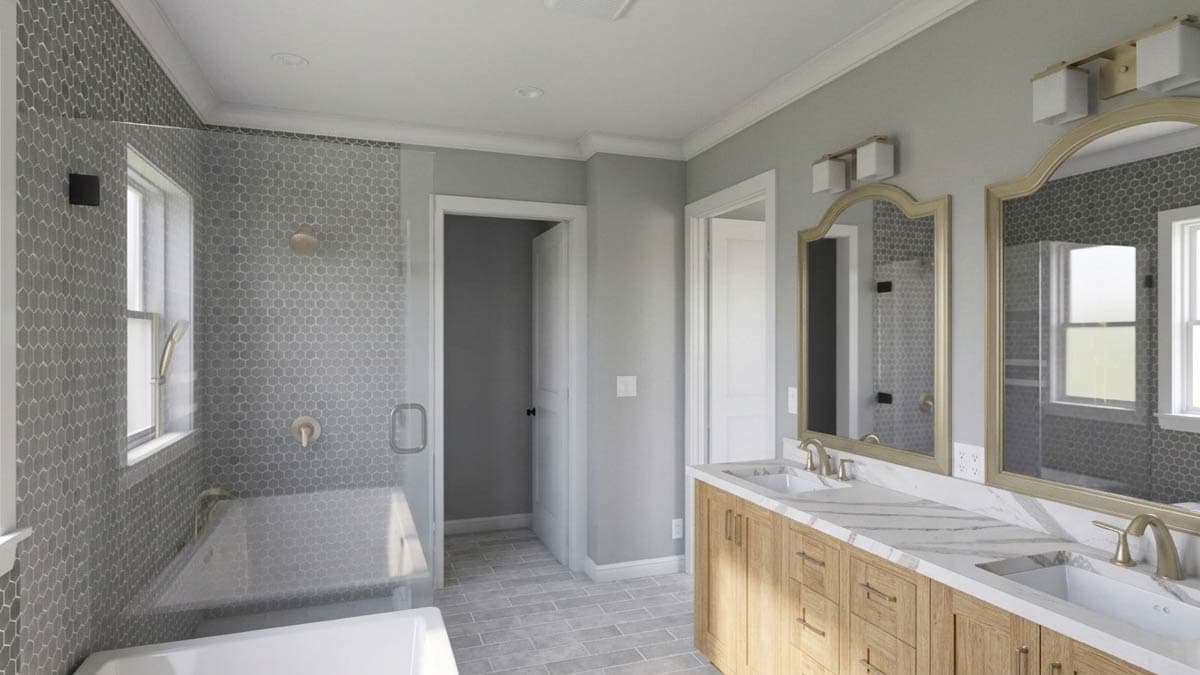 Bathroom with dual vanity, soaking tub, and glass-enclosed shower with hexagonal tile.