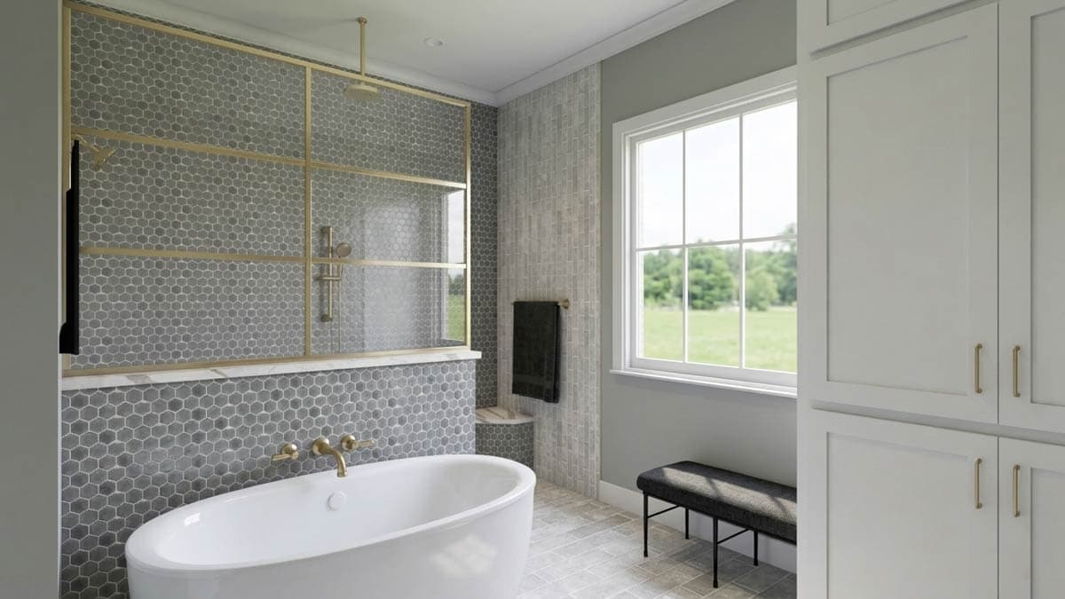 Bathroom interior with freestanding tub, walk-in shower with hexagonal tile, and storage cabinets.