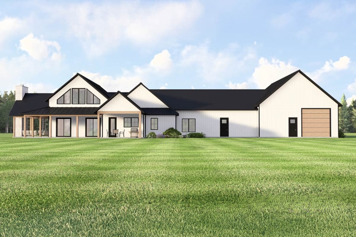 Modern Farmhouse house plan exterior with prominent gables, covered porch, stone chimney, and a two-car garage.