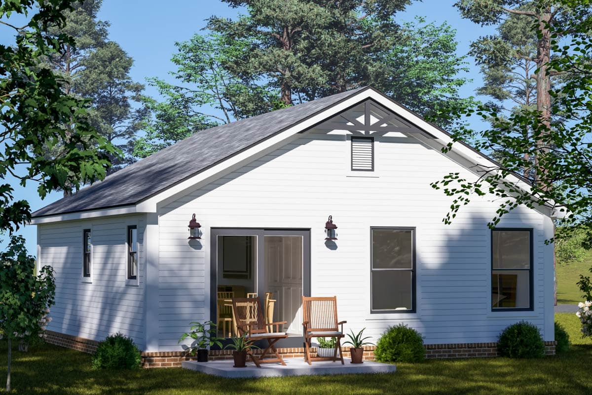 House plan exterior with white siding, gable end with decorative truss, and sliding glass doors.