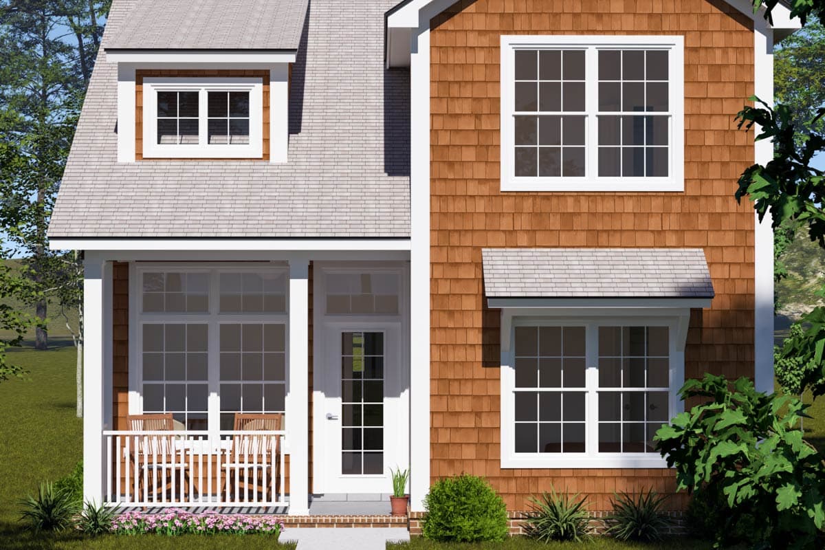 House plan exterior of a two-story home with cedar shakes, front porch, and dormer.